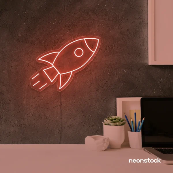 Rocket neon sign in peachy pink for kids' rooms, play areas, and space-themed nursery decor.
