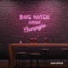 Save Water Drink Champagne neon sign in baby pink for party kitchens, wine bars, and bubbly wall decor.
