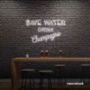 Save Water Drink Champagne neon sign in white for party kitchens, wine bars, and bubbly wall decor.