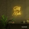 Self Made neon sign in golden yellow for home offices, studios, and entrepreneur decor.