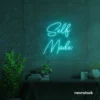 Self Made neon sign in mint green for home offices, studios, and entrepreneur decor.