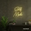 Self Made neon sign in warm white for home offices, studios, and entrepreneur decor.