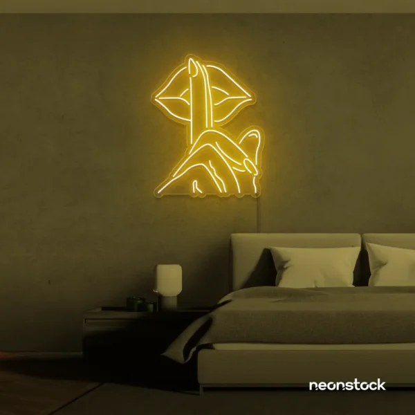 Shushing lips neon sign in golden yellow for beauty salons, glam rooms, and bold home decor.