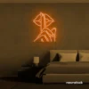 Shushing lips neon sign in orange for beauty salons, glam rooms, and bold home decor.