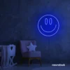 Smiley face neon sign in dark blue for dorm walls, teen rooms, and joyful room decor.