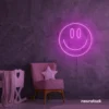 Smiley face neon sign in pink for dorm walls, teen rooms, and joyful room decor.