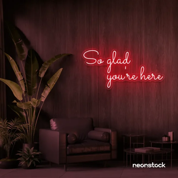 So Glad You Are Here neon sign in red for entryways, restaurant walls, and welcoming interiors.