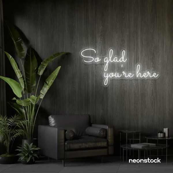 So Glad You Are Here neon sign in white for entryways, restaurant walls, and welcoming interiors.