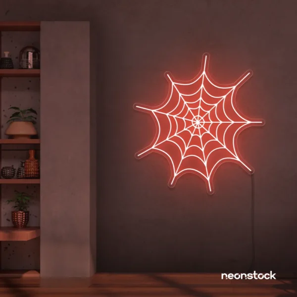 Spider web neon sign in peachy pink for kids room wall decor or Halloween-themed spaces