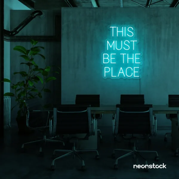 This Must Be The Place neon sign in mint green for cozy salons, boutique shops, and cafe decor.
