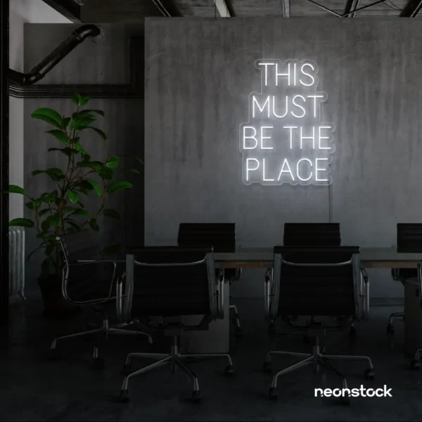 This Must Be The Place neon sign in white for cozy salons, boutique shops, and cafe decor.