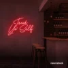 Treat Yo Self neon sign in red for salons, spas, dessert shops, and cozy home spaces.
