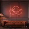 Two-faced emoji neon sign in peachy pink for teen room wall decor