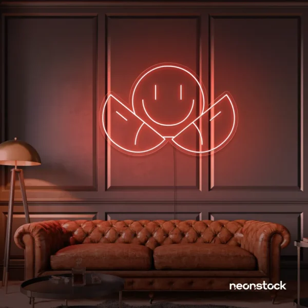 Two-faced emoji neon sign in peachy pink for teen room wall decor