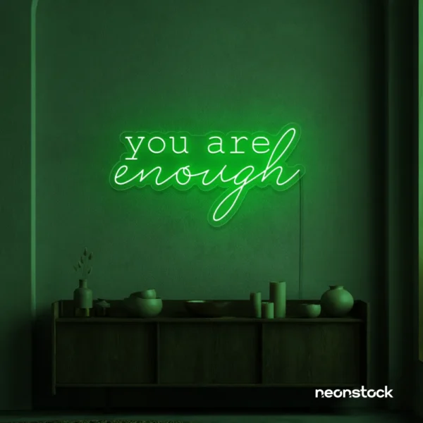 You Are Enough neon sign in deep green for self-love decor, therapy rooms, and calm spaces.