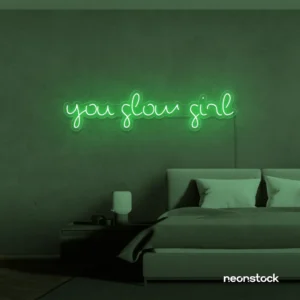 You Glow Girl neon sign in green for dorm rooms, vanity walls, and beauty studio decor.