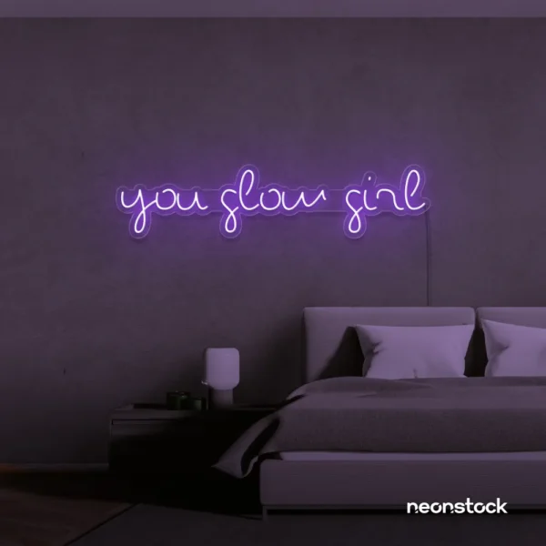 You Glow Girl neon sign in purple for dorm rooms, vanity walls, and beauty studio decor.